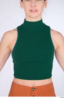 Zolzaya casual dressed green turtleneck sleeveless crop top upper body…